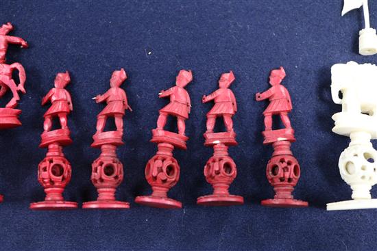 A Canton red-stained and natural ivory chess set (one white knight and one bishop deficient)